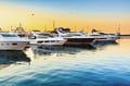 Marine boats lined up at dock
