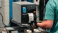 ASRaymond warehouse label machine printing